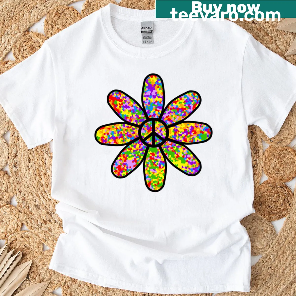 70s style peace symbol graphic with rainbow colors on t-shirt. — on a men's t-shirt
