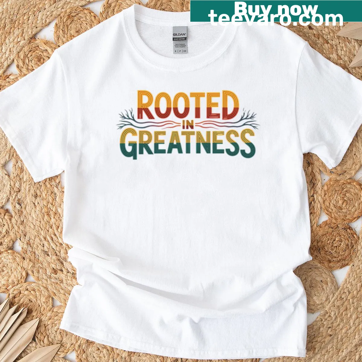 T-shirt featuring the phrase 'Rooted In Greatness' with a legacy theme — on a men's t-shirt