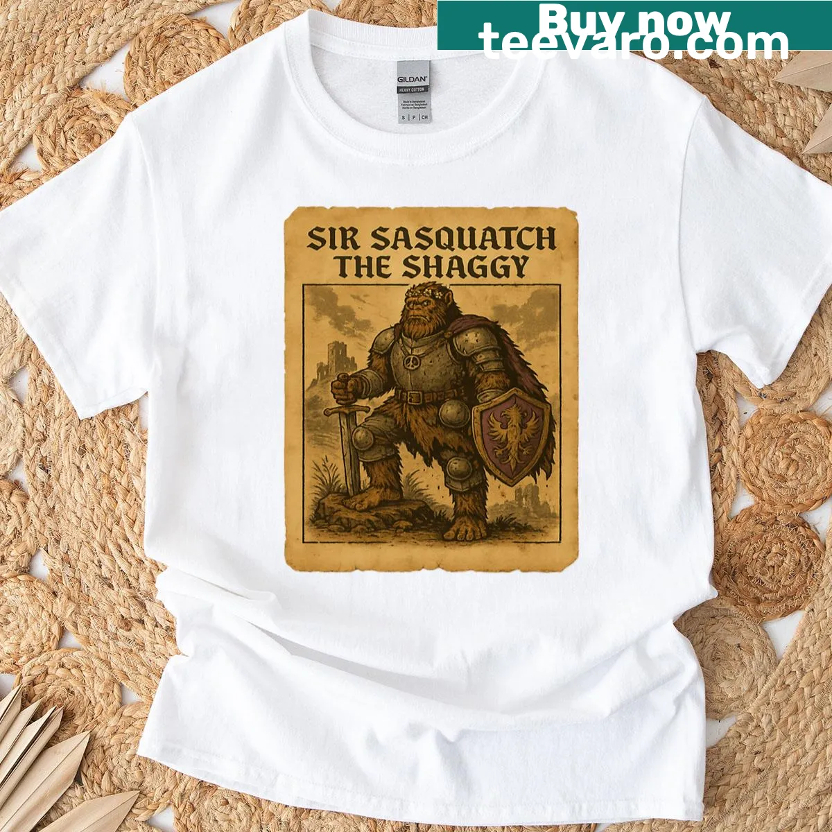 Illustrative T-shirt featuring a medieval Bigfoot knight design — on a men's t-shirt