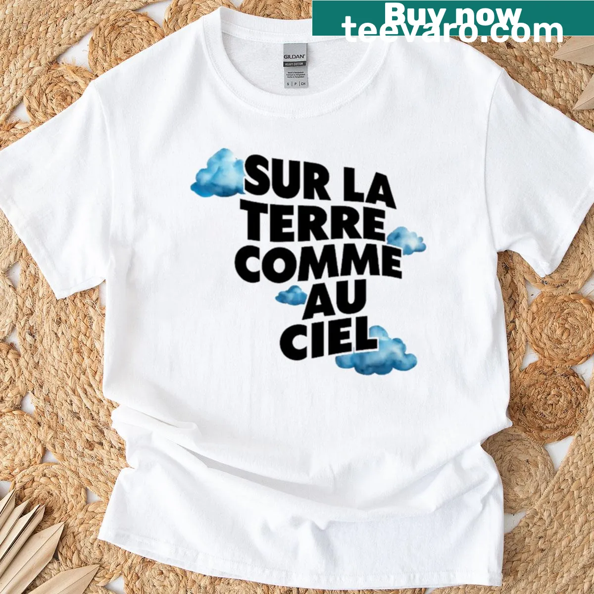 Inspirational typography T-shirt with the phrase Sur Le Terre Comme Au Ciel — on a men's t-shirt