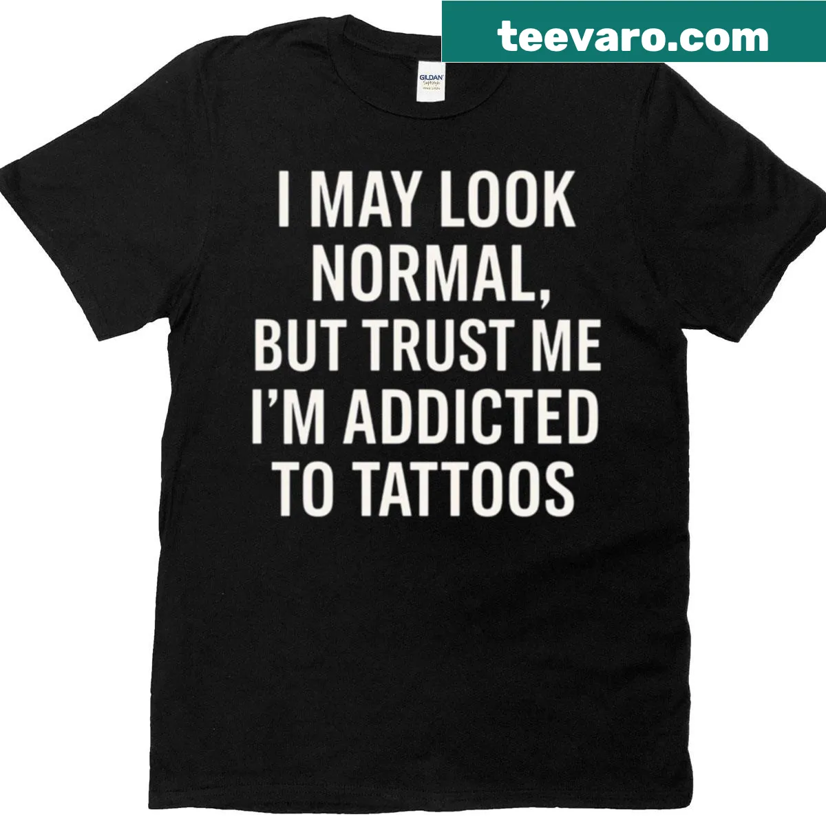 Minimalist T-shirt with the word 'Tatoos' in bold letters — on a men's t-shirt