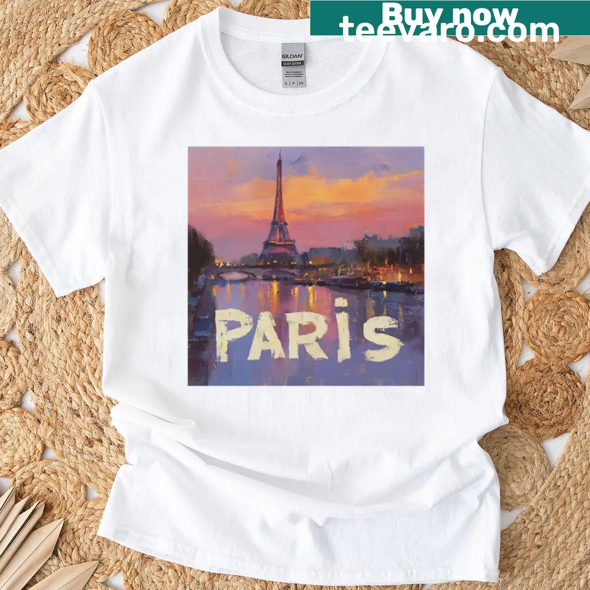 T-shirt featuring an illustration of the Eiffel Tower — on a men's t-shirt
