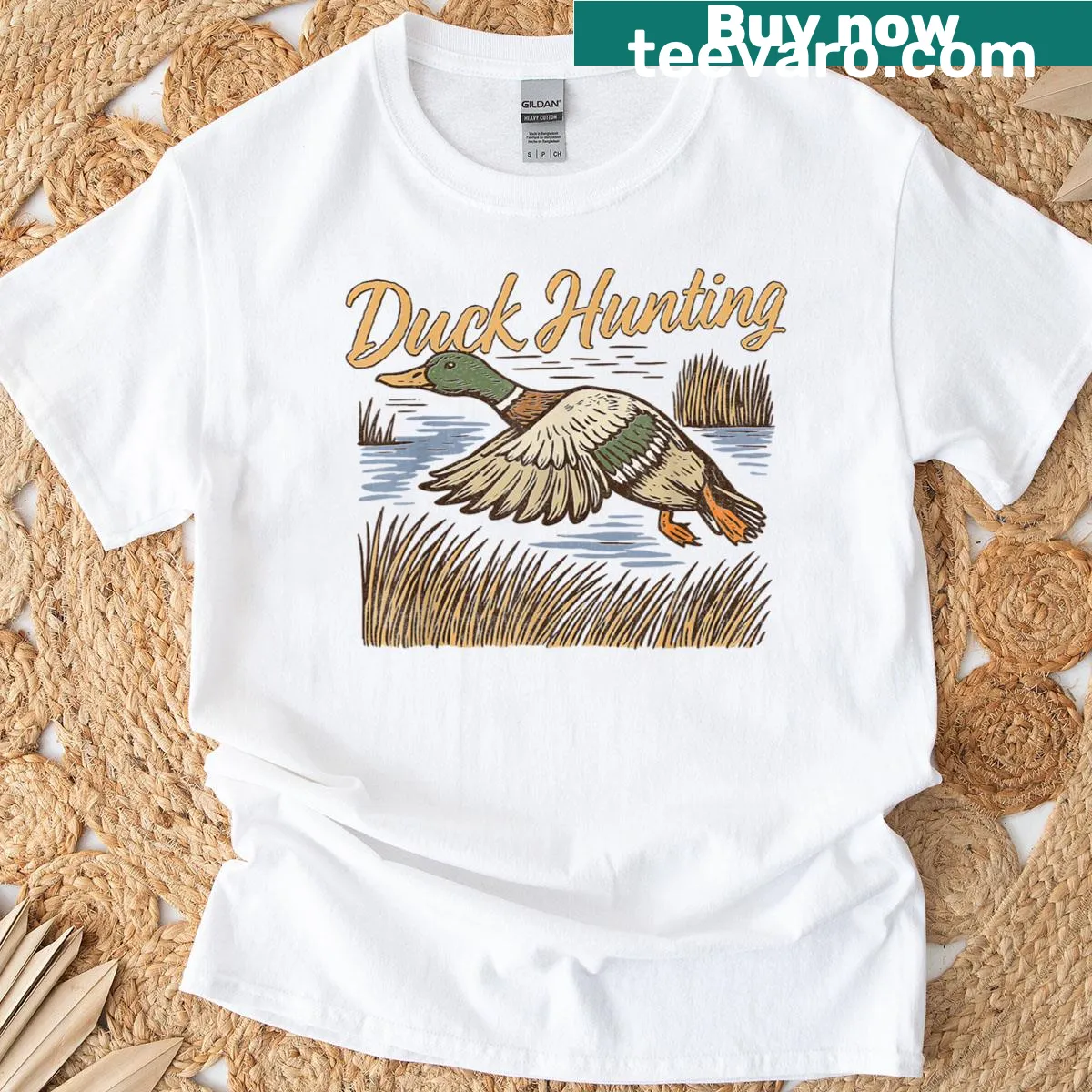 Vintage duck hunting t-shirt featuring a mallard in flight — on a men's t-shirt