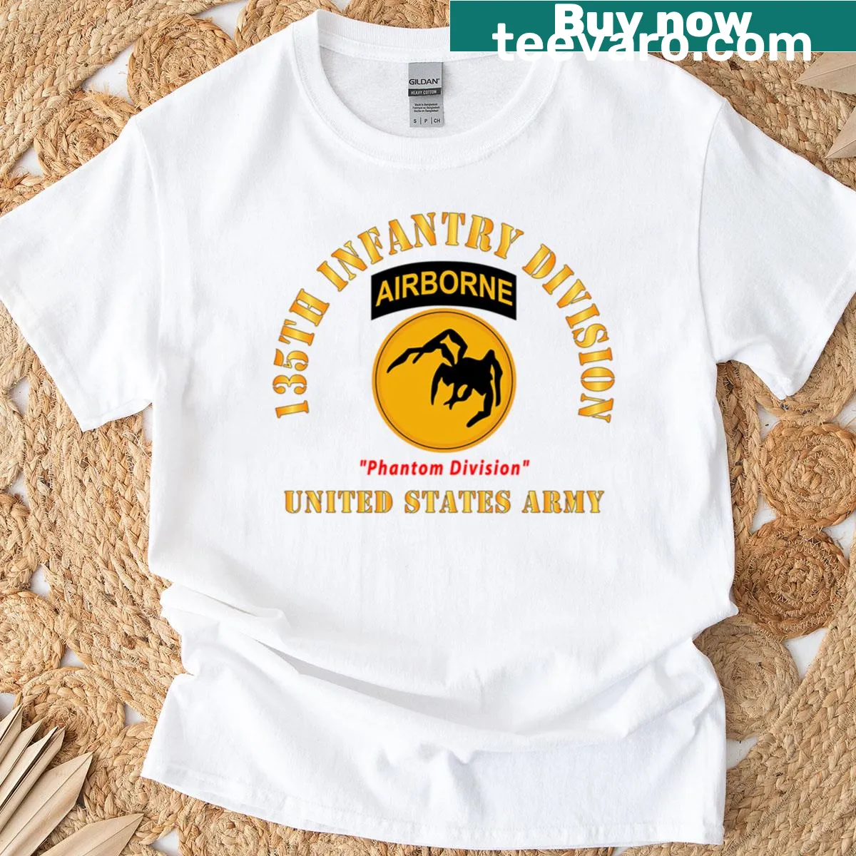 135th Airborne Division emblem T-shirt — on a men's t-shirt