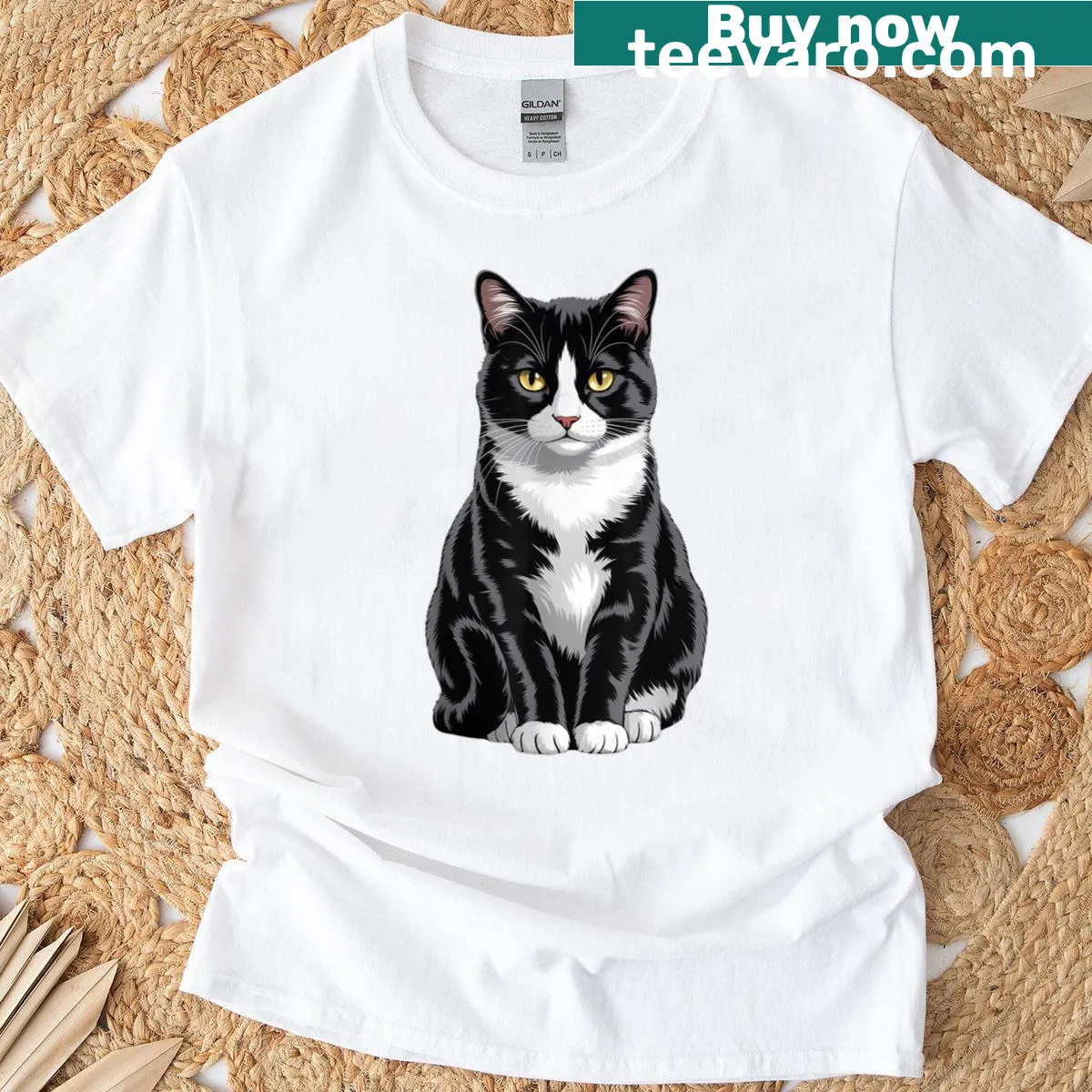 T-shirt featuring a cute illustration of a tuxedo cat — on a men's t-shirt