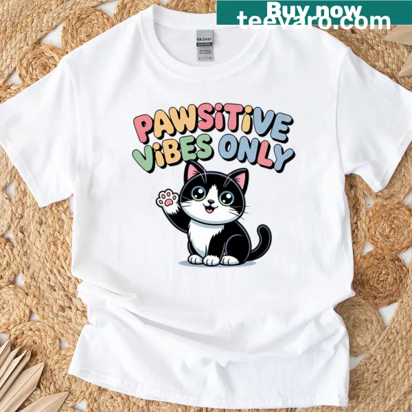 Cute T-shirt featuring tuxedo cat design and positive message.