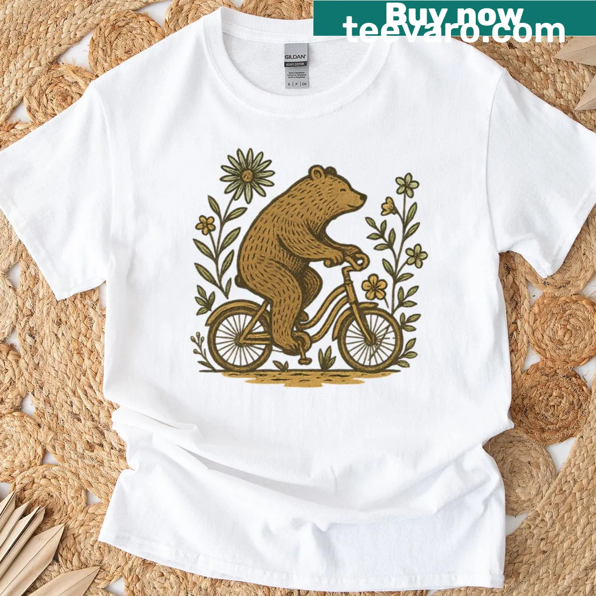 Vintage illustration of a bear on a bike surrounded by forest flowers — on a men's t-shirt