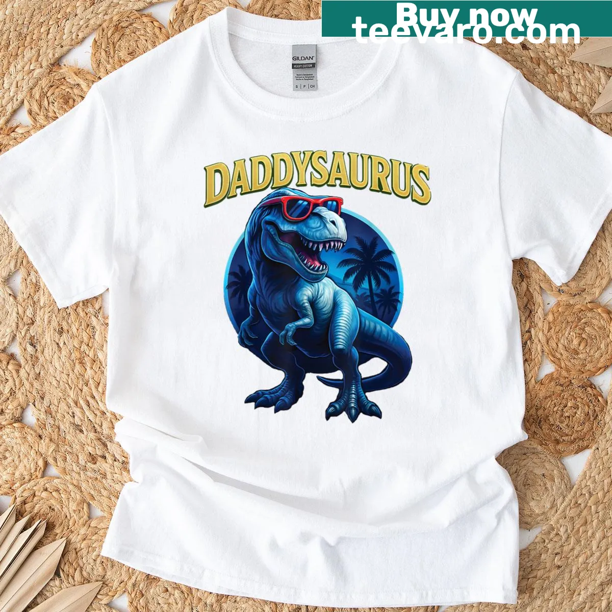 Cartoon T-rex with 'Daddysaurus' text on a t-shirt — on a men's t-shirt