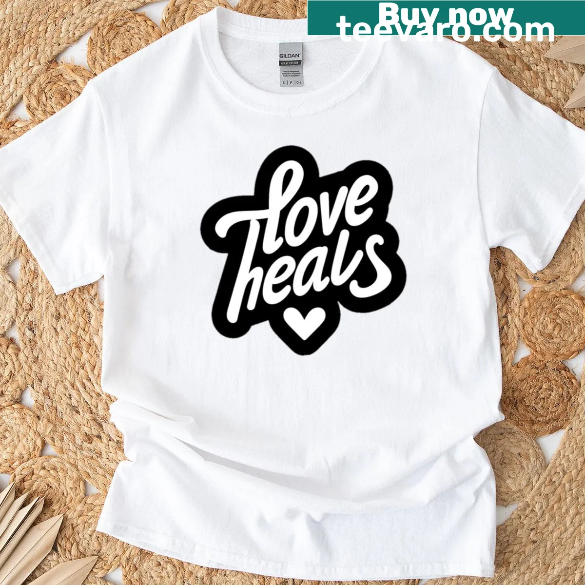 Love Heals t-shirt with a bold, uplifting message — on a men's t-shirt