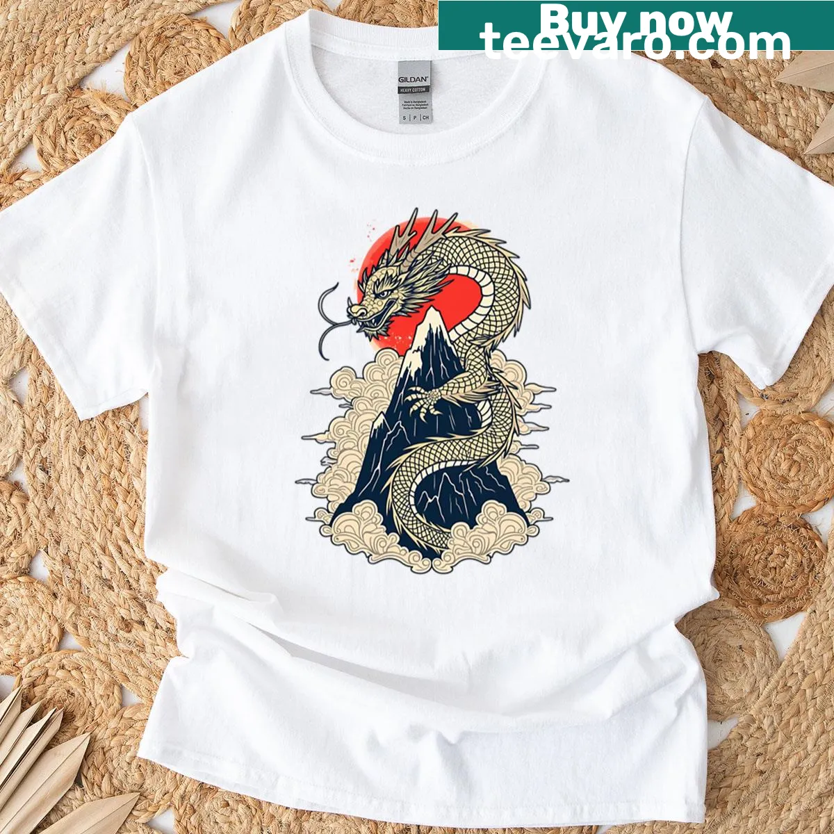 Dragon illustration on a t-shirt with mountains in the background — on a men's t-shirt