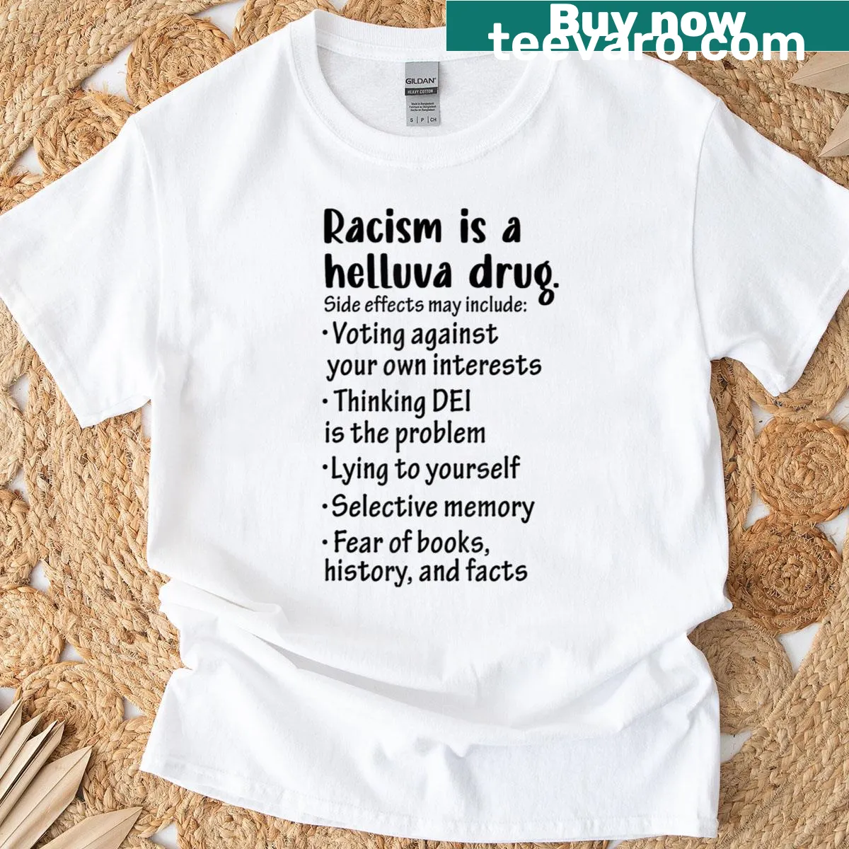 T-shirt with bold text stating 'Racism Is A Helluva Drug' — on a men's t-shirt