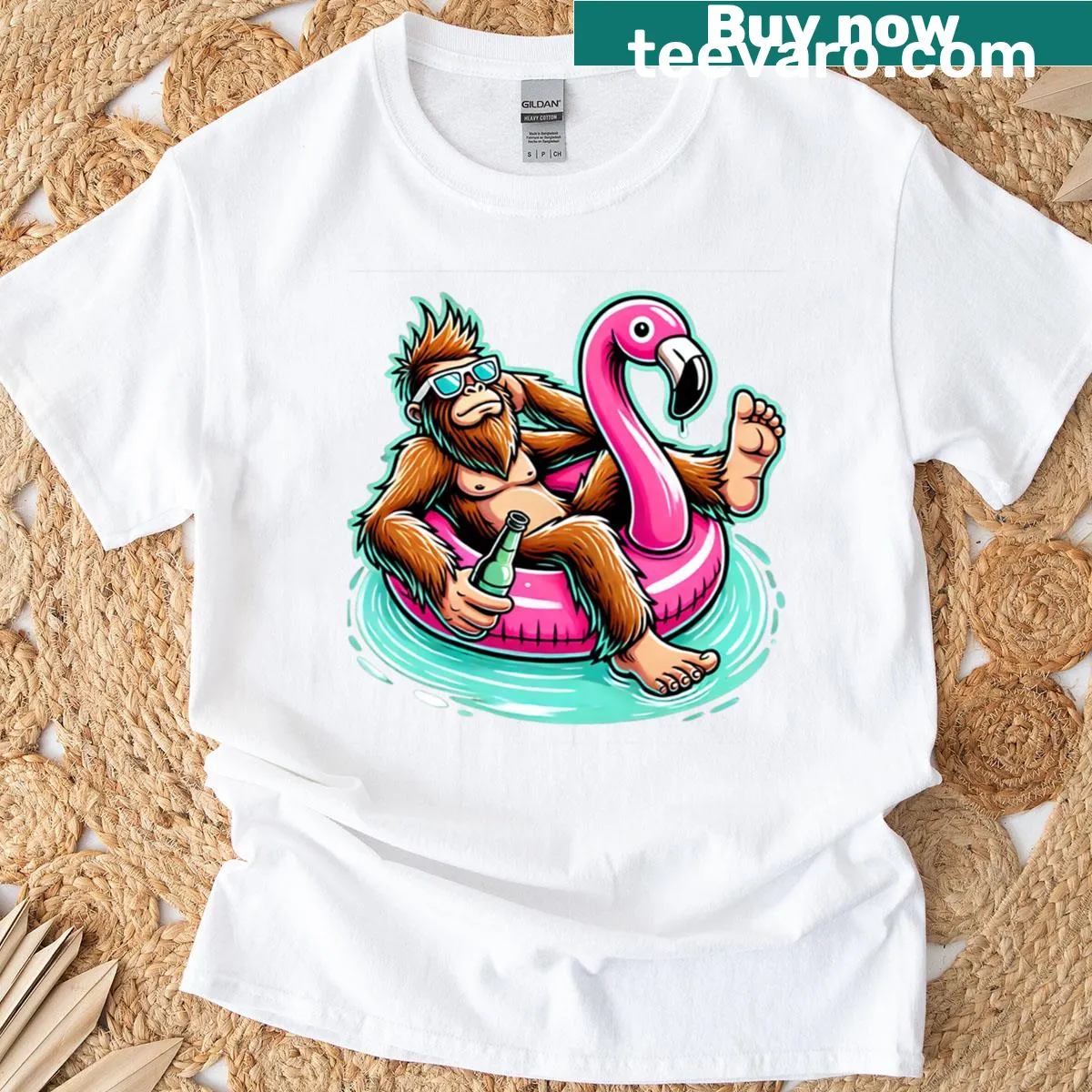 Playful t-shirt with Bigfoot on a flamingo float, perfect for summer vibes. — on a men's t-shirt