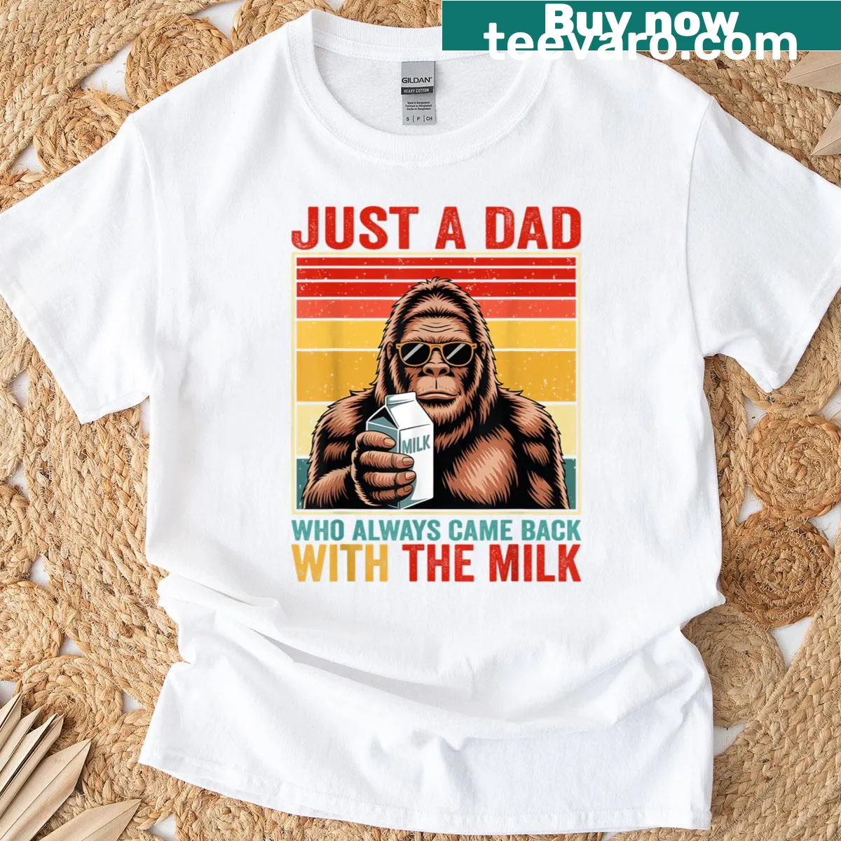Humorous t-shirt featuring Bigfoot dad theme and playful typography. — on a men's t-shirt