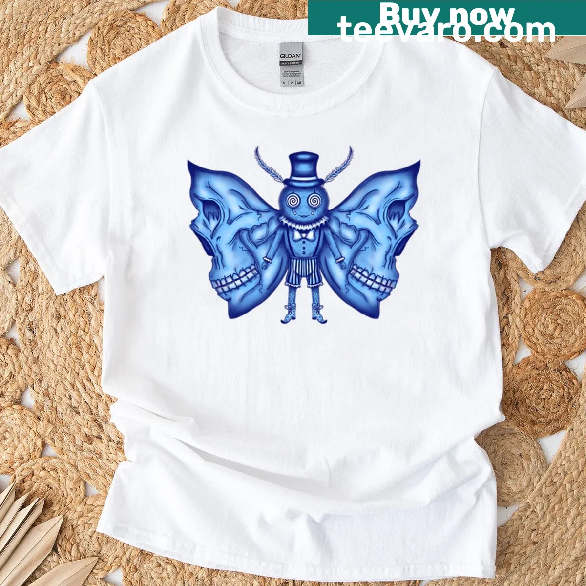 Illustrated blue skull moth design on premium T-shirt — on a men's t-shirt