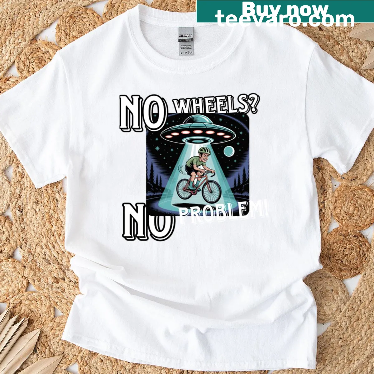 Humorous T-shirt featuring a cyclist being abducted by a UFO in a playful design. — on a men's t-shirt