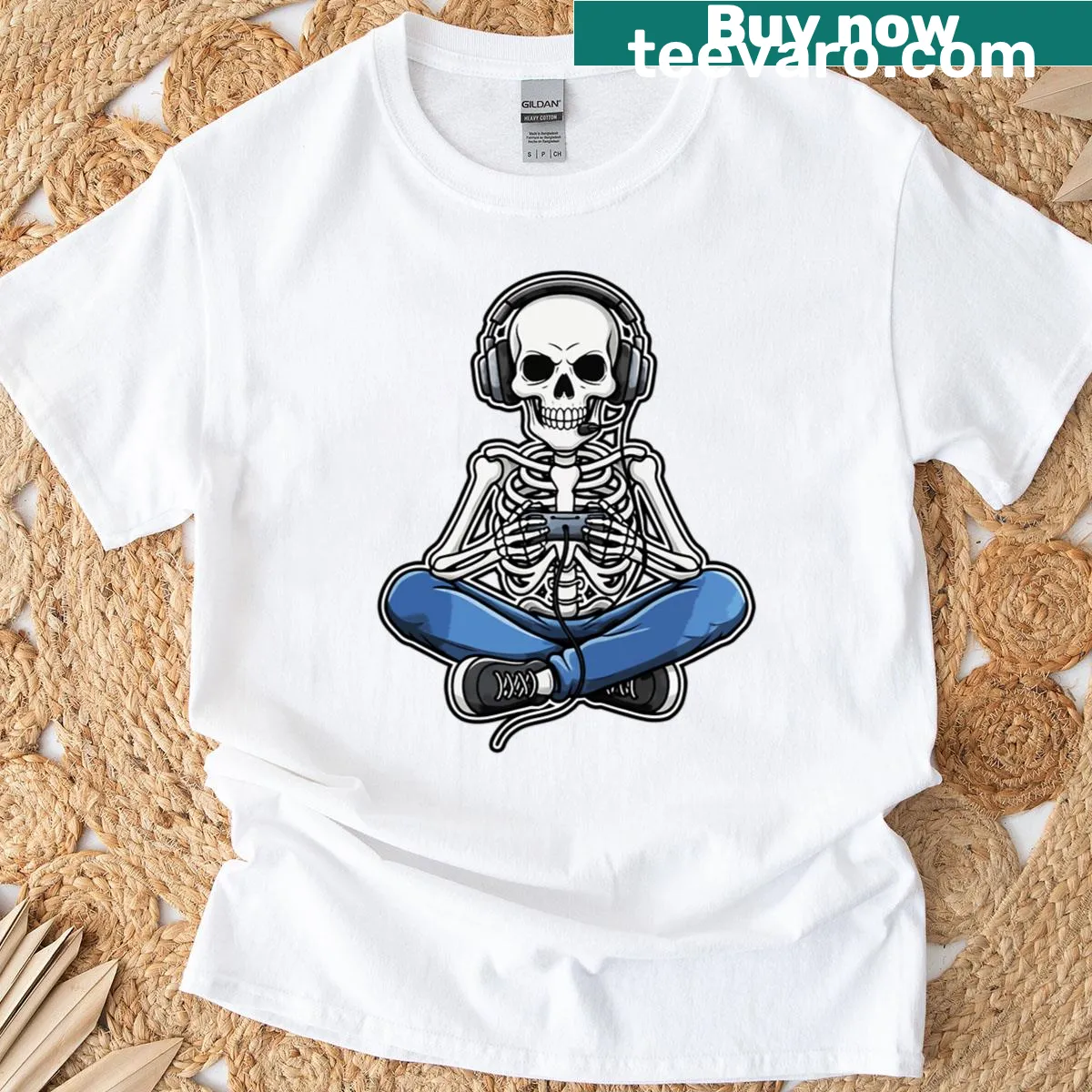 Cartoon skeleton gamer with headphones and controller on t-shirt — on a men's t-shirt
