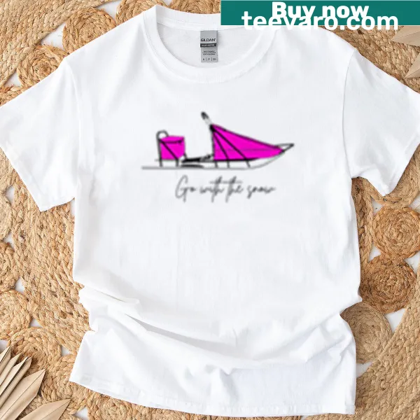 Pink t-shirt with snowy mountain graphic and 'Go With The Snow' text