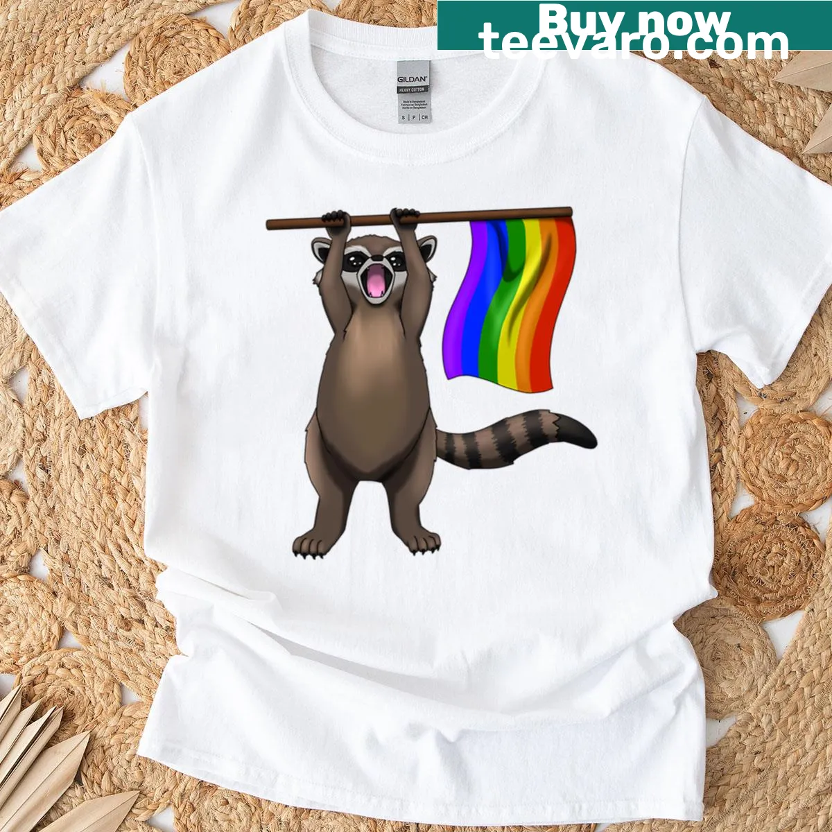 Joyful raccoon graphic with rainbow theme on T-shirt — on a men's t-shirt