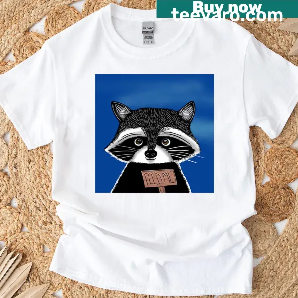 Raccoon holding a 'Feed Me' sign on a T-shirt