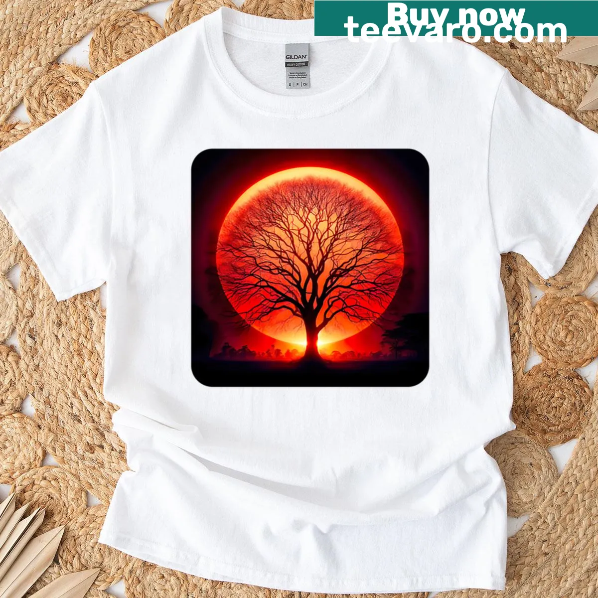 Oversized t-shirt featuring a serene rising sun graphic — on a men's t-shirt