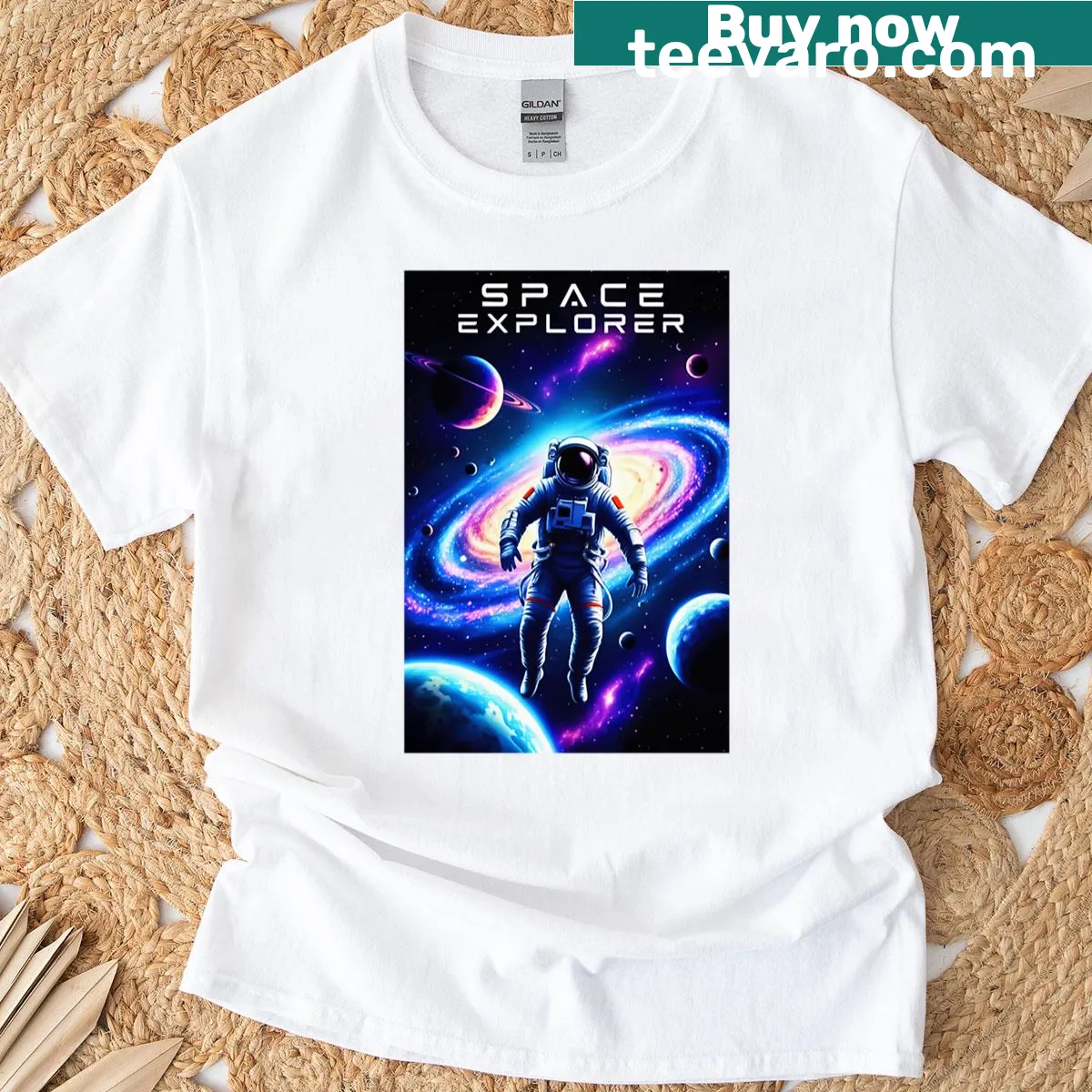 Illustrative t-shirt featuring an astronaut and cosmic elements — on a men's t-shirt