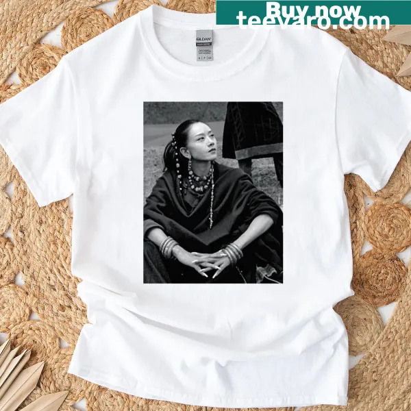 T-shirt featuring an illustration of a Tibetan Shepherdess dog