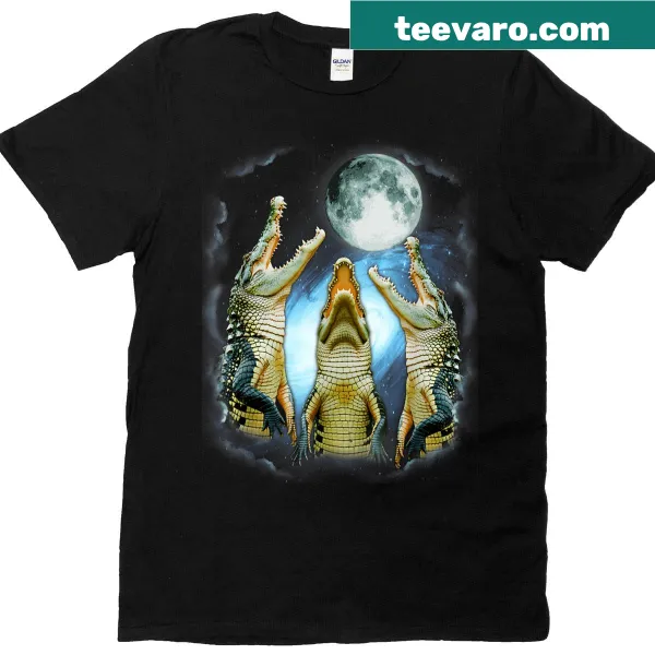 T-shirt featuring three wolves howling at the moon in a playful design.