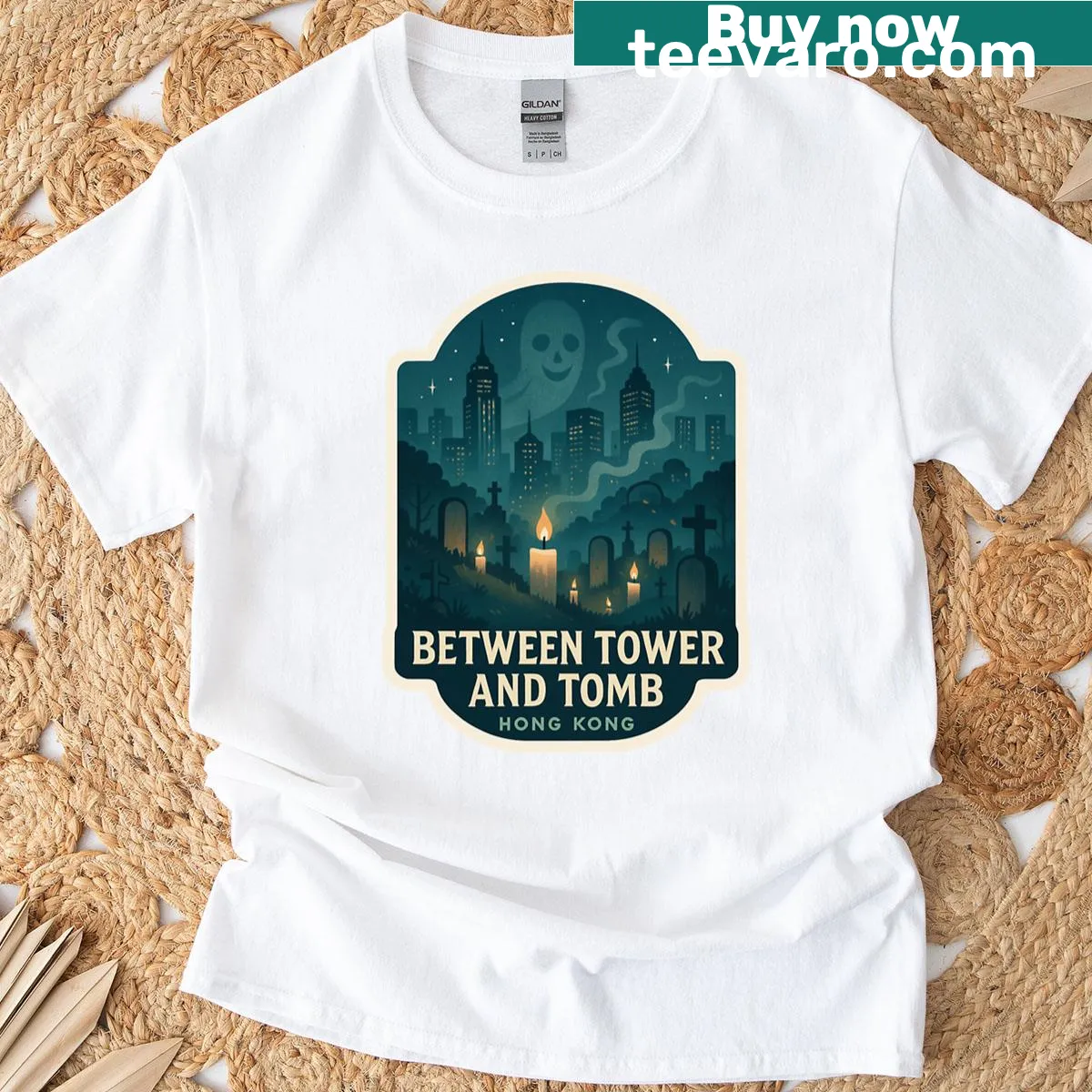 Playful Halloween T-shirt with tower and tomb graphics — on a men's t-shirt