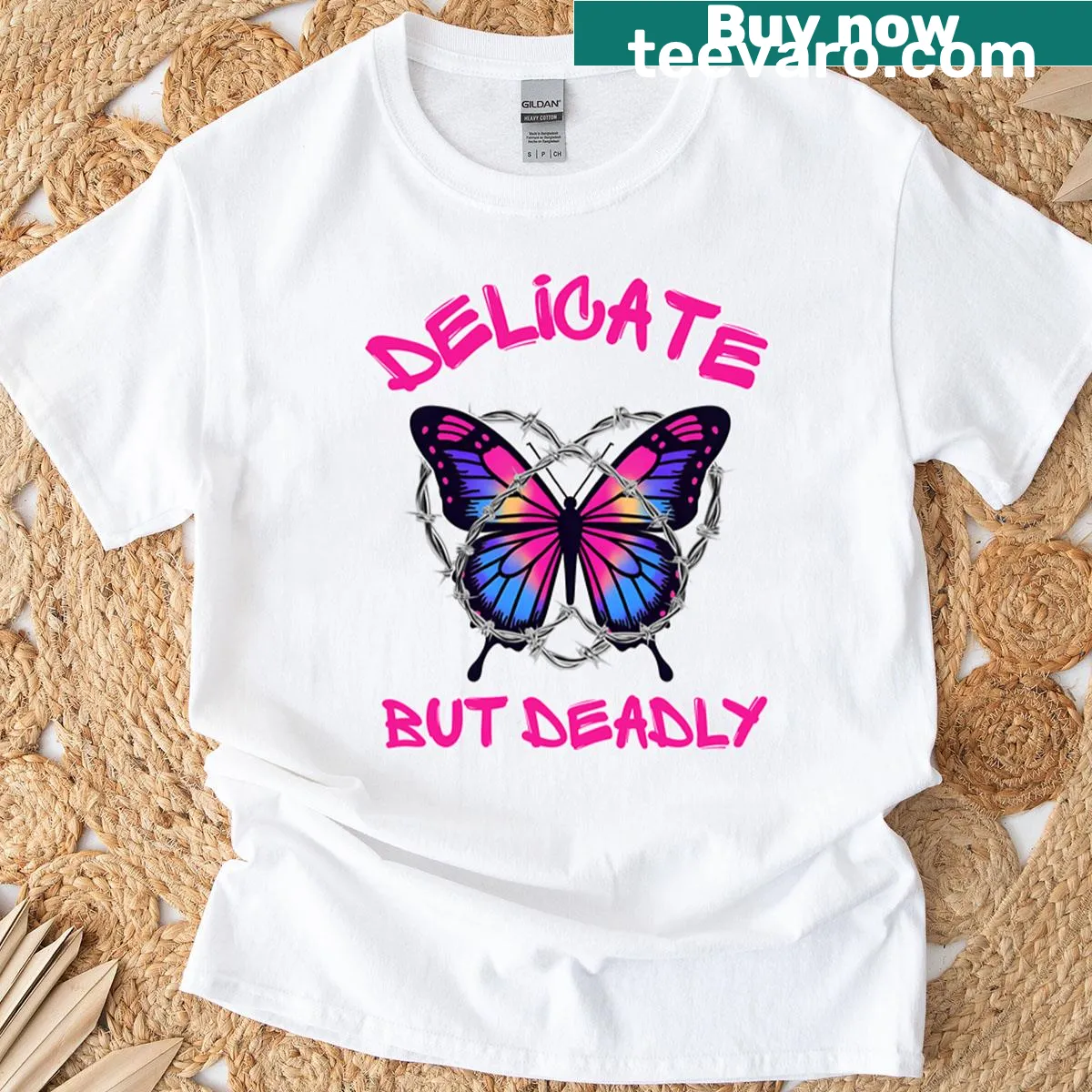 Edgy T-shirt featuring the phrase 'Delicate But Deadly' with a butterfly design — on a men's t-shirt