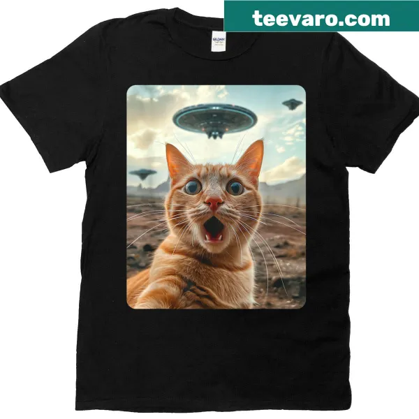 Whimsical T-shirt with a cat taking a selfie with a UFO