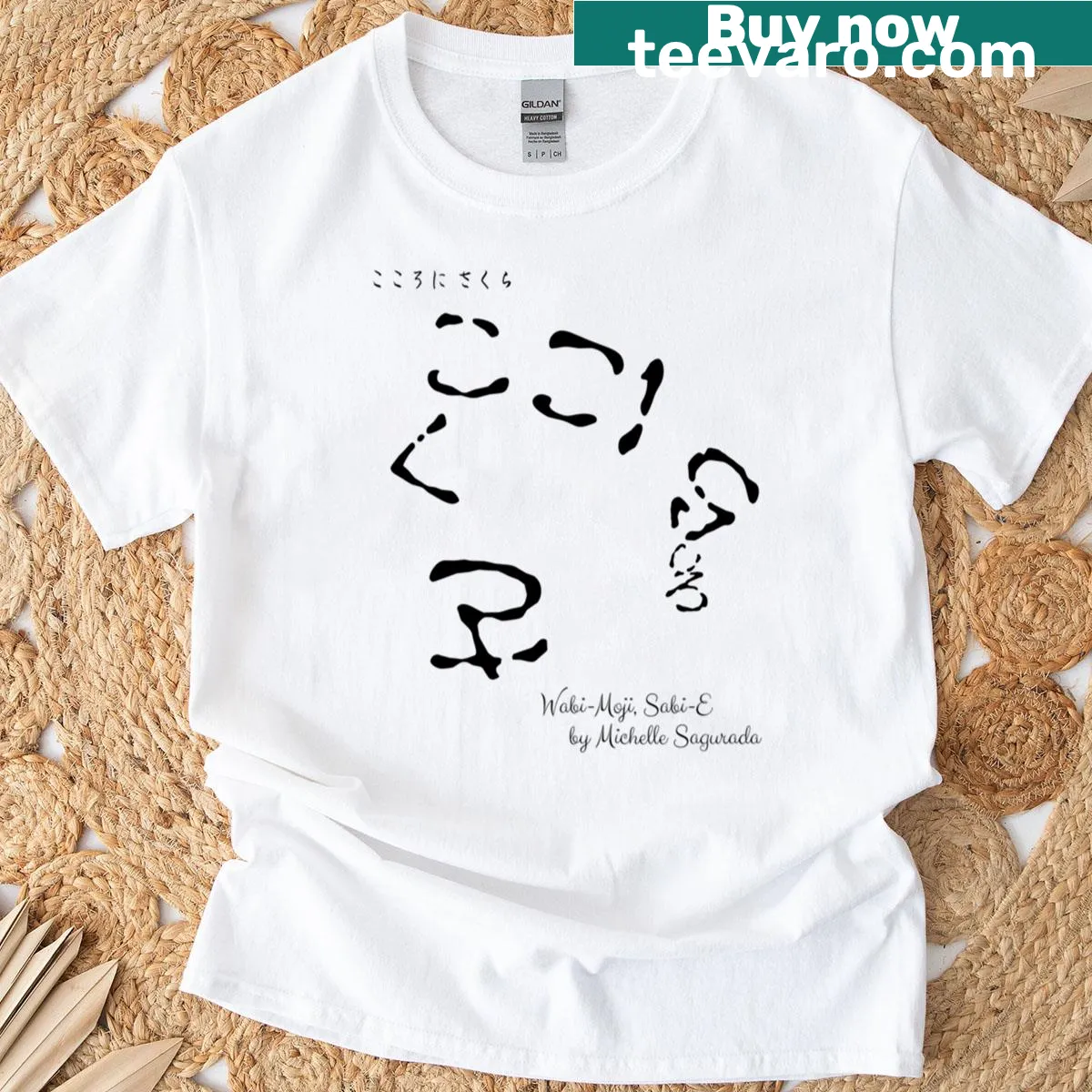 Hiragana face art T-shirt with 'Sakura In My Soul' text — on a men's t-shirt