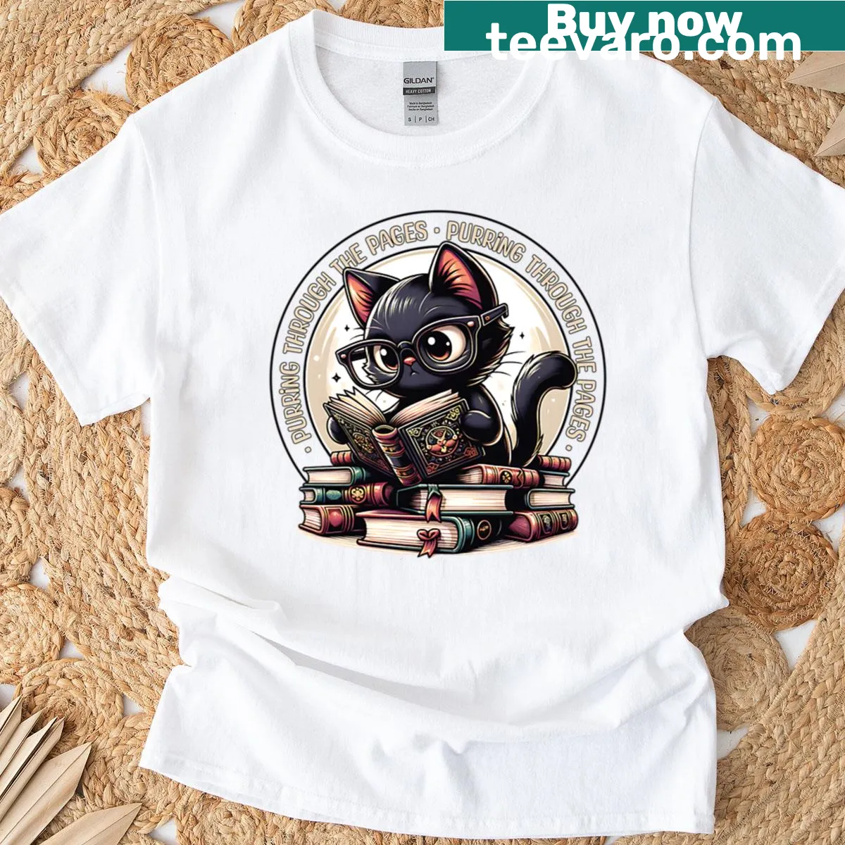 Cute black cat reading a book graphic on a t-shirt — on a men's t-shirt