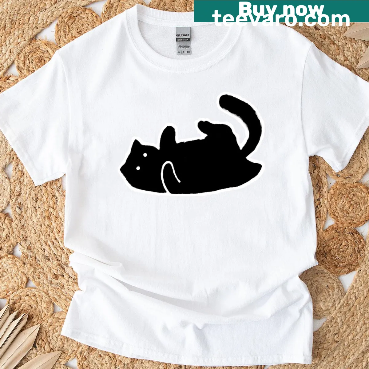 Whimsical black cat showing belly graphic T-shirt — on a men's t-shirt