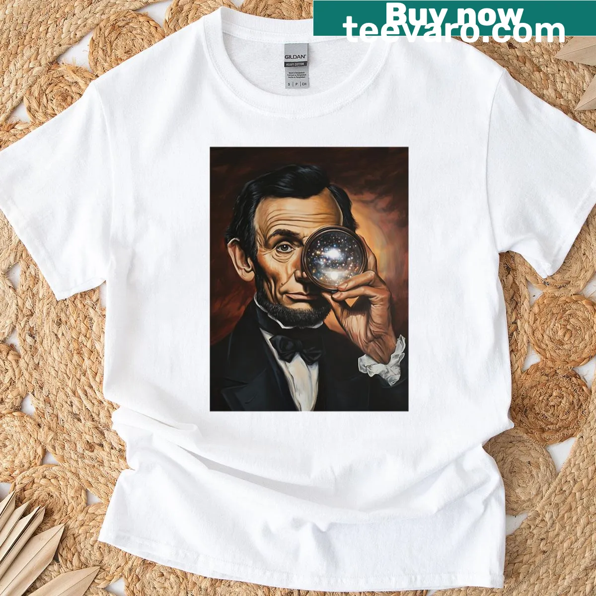 Surreal Lincoln T-shirt with cosmic themes and monocle illustration — on a men's t-shirt