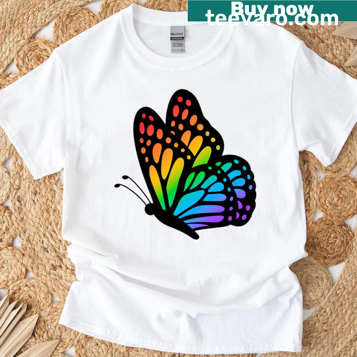 Illustrated butterfly design on a pride-themed T-shirt — on a men's t-shirt