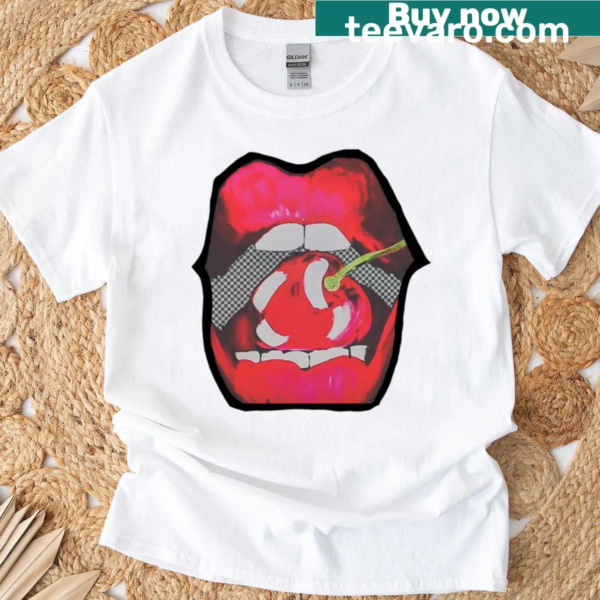 Playful T-shirt featuring an illustration of a cherry with a bite taken out. — on a men's t-shirt