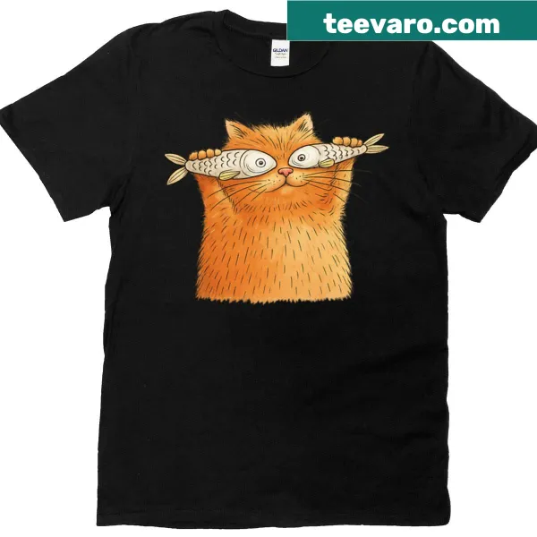 Whimsical illustration of an orange cat holding fish eyes on a t-shirt.