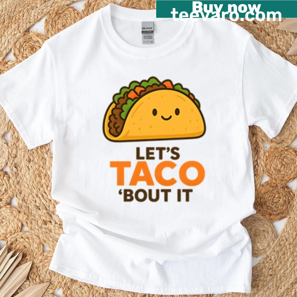 Funny taco cartoon design T-shirt with the phrase Let's Taco Bout It — on a men's t-shirt
