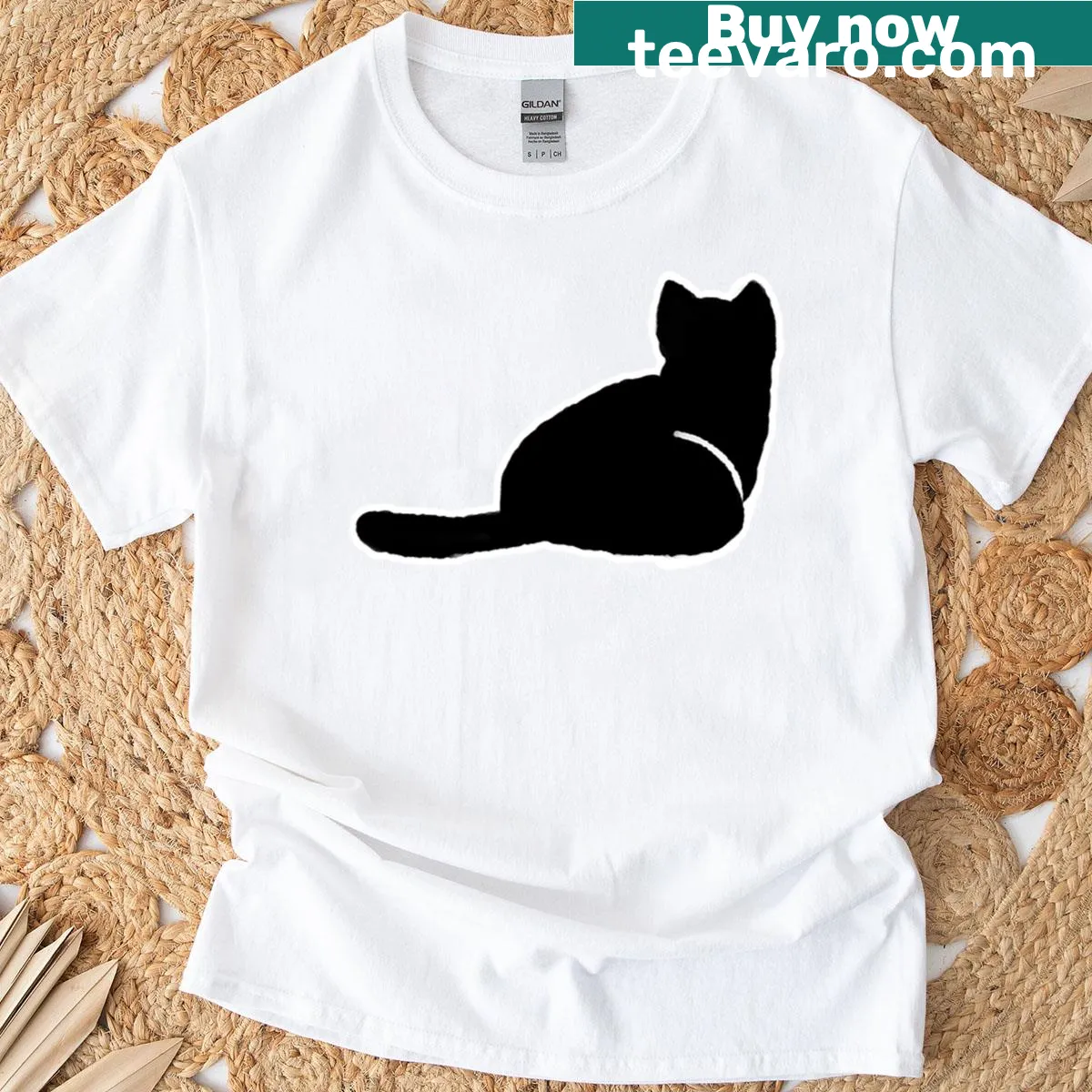 Minimalist black cat silhouette on the back of a t-shirt — on a men's t-shirt