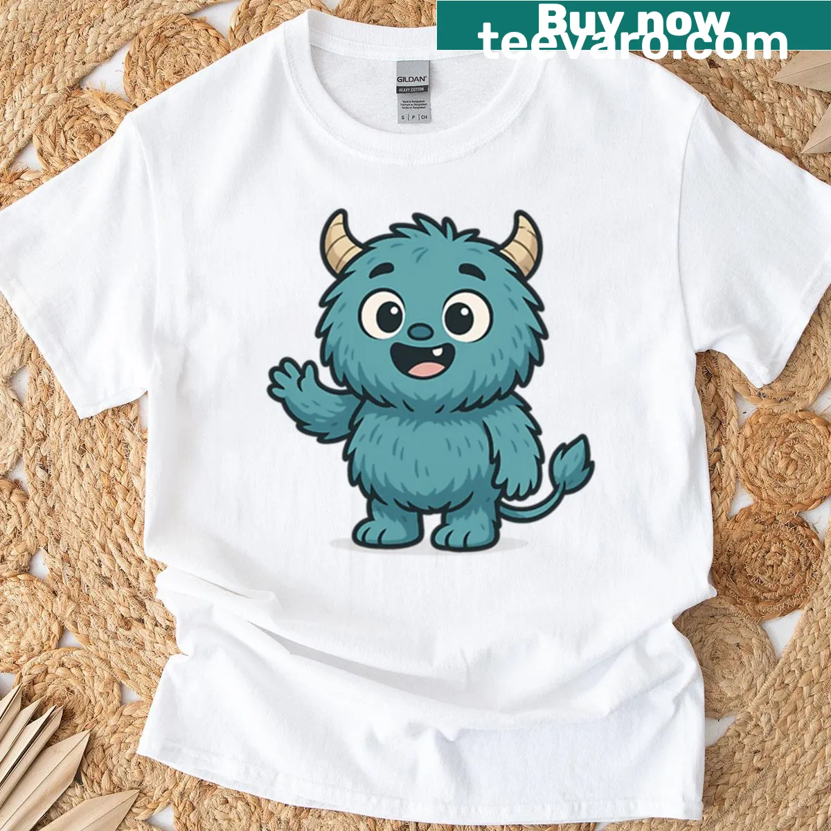 Oversized T-shirt featuring a charming baby monster design in vintage-distressed style. — on a men's t-shirt