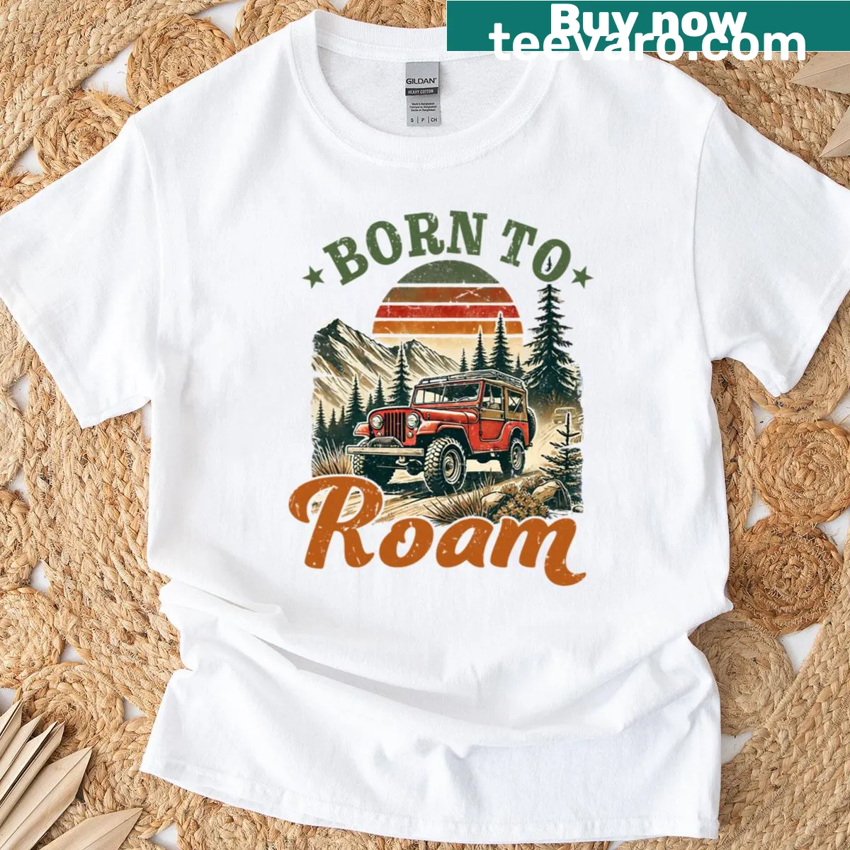 T-shirt with 'Born To Roam' badge-style graphic — on a men's t-shirt