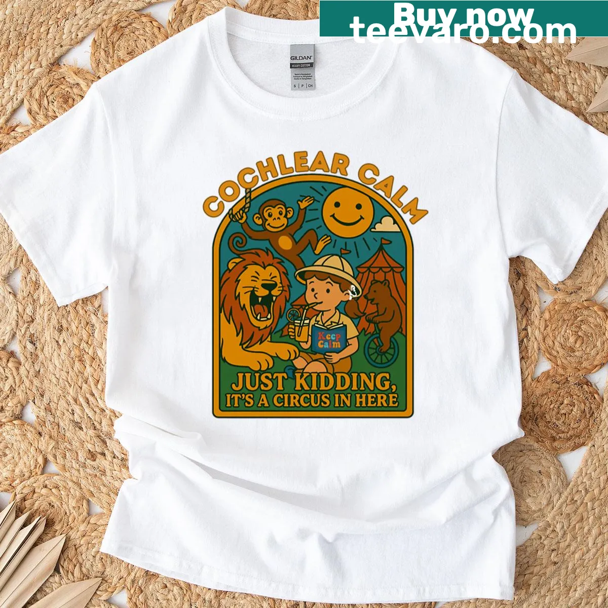 Oversized tee with humorous cochlear implant theme and circus design — on a men's t-shirt