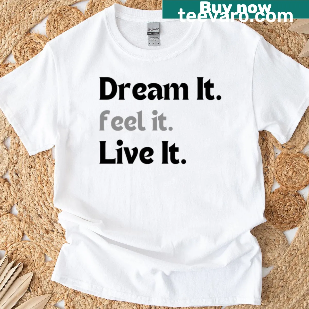 Minimalist motivational t-shirt with the quote 'Dream It, Feel It, Live It' — on a men's t-shirt