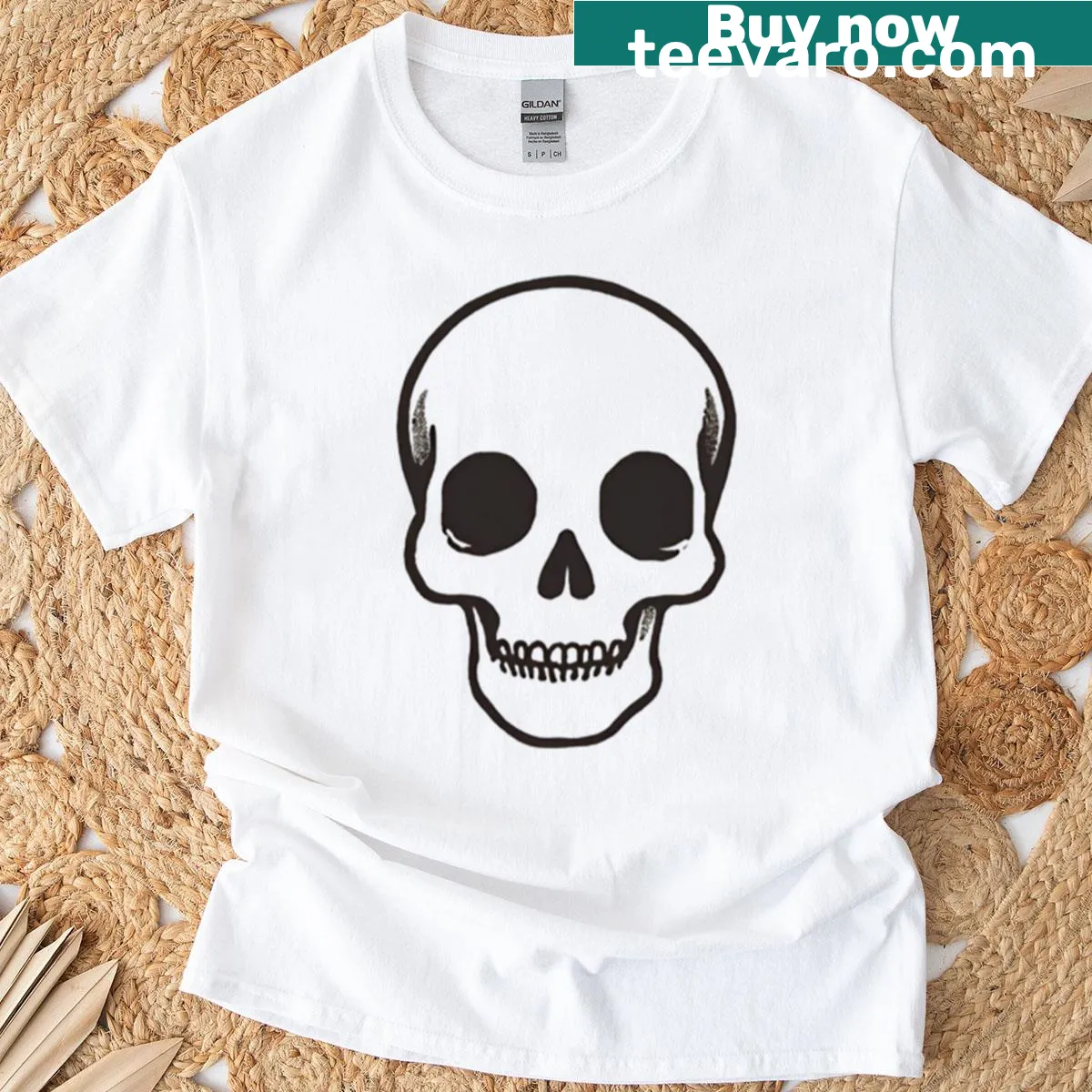 Oversized t-shirt with a skull and bones Halloween graphic — on a men's t-shirt