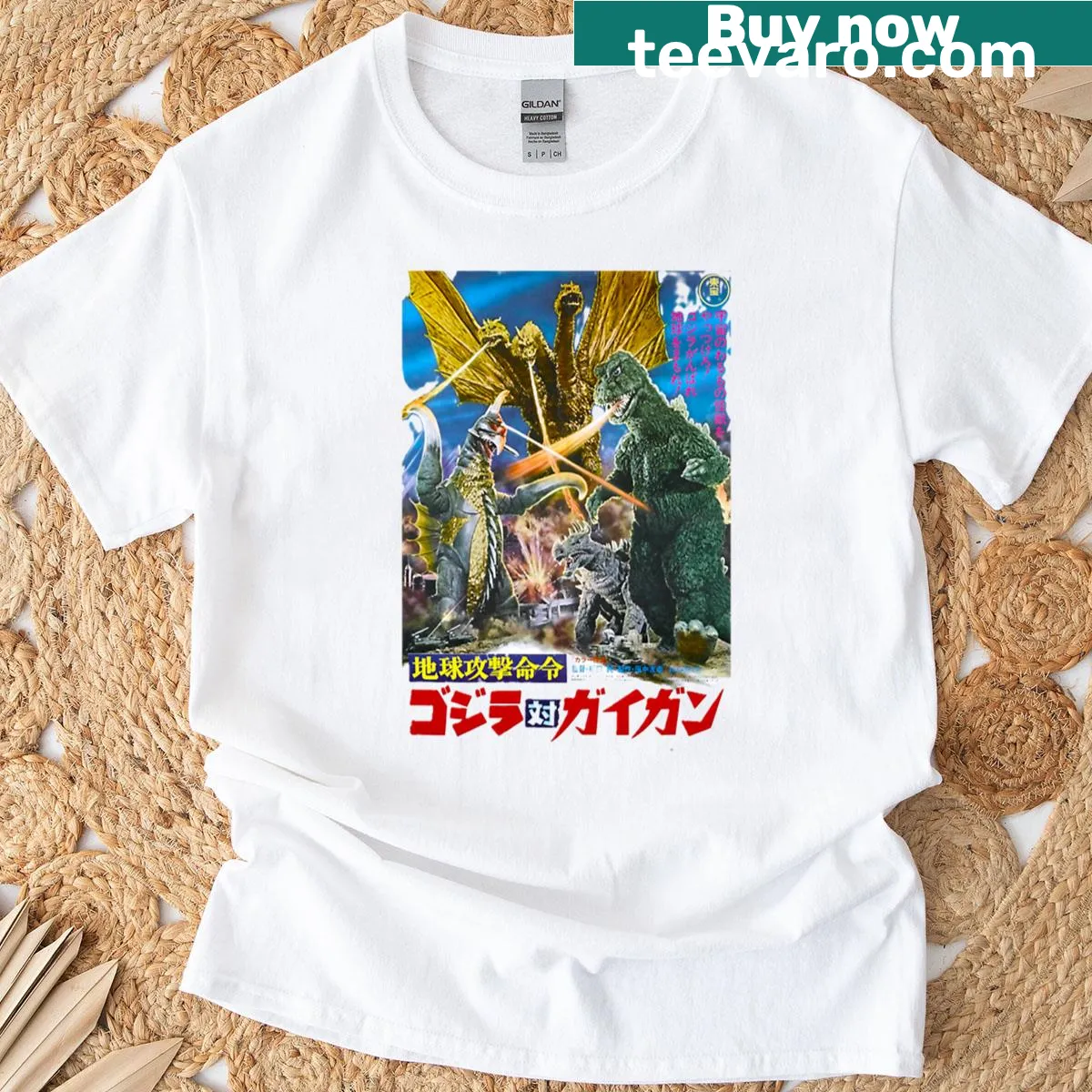 Vintage-style T-shirt with Godzilla and kaiju movie poster art — on a men's t-shirt