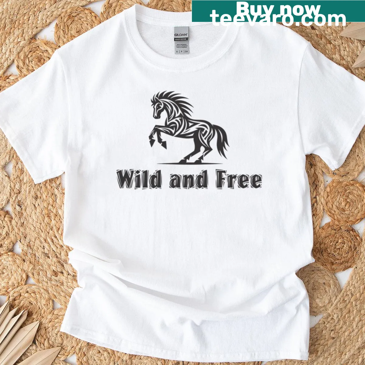 Graphic t-shirt that reads 'Wild And Free' with an adventurous design. — on a men's t-shirt