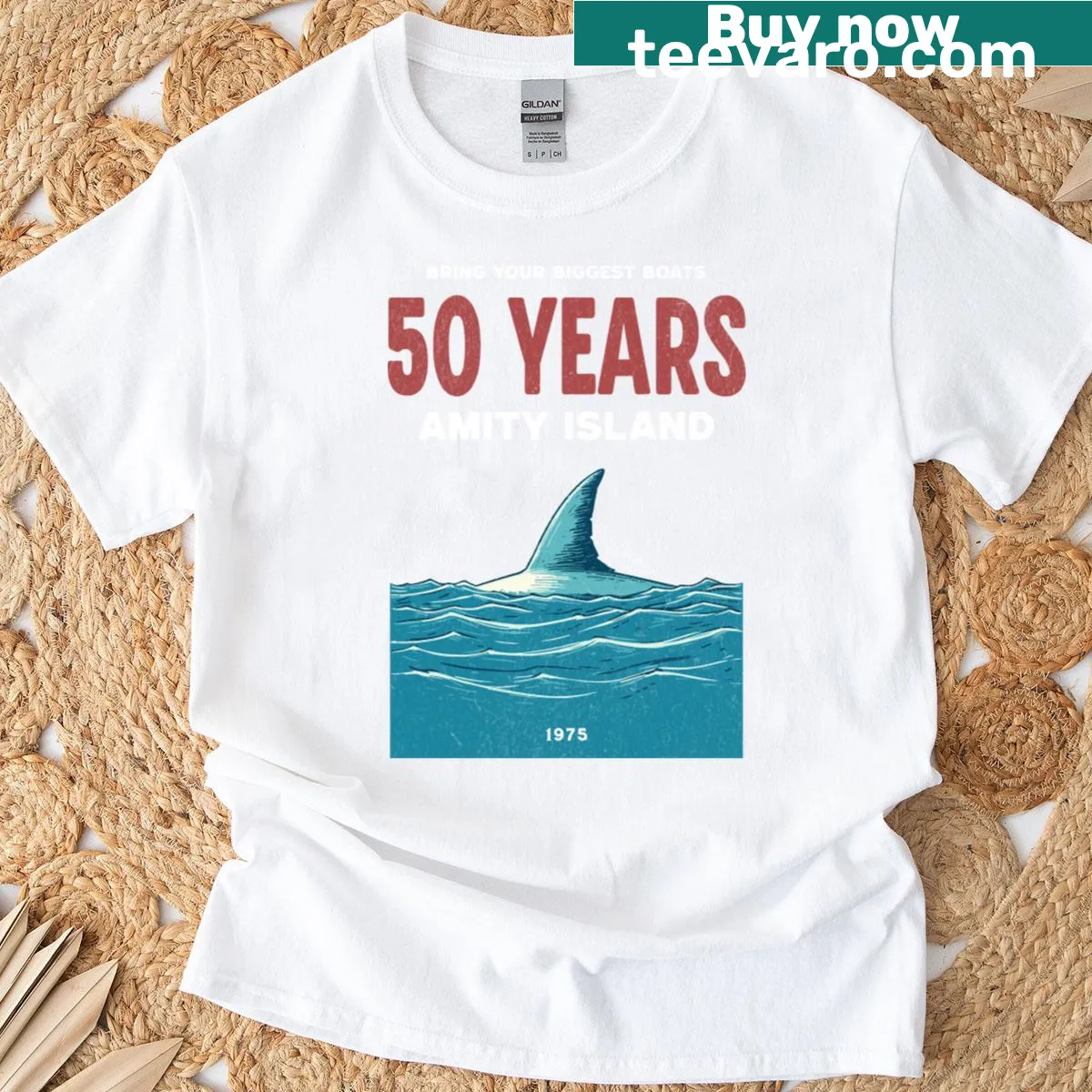 T-shirt celebrating 50 years of Jaws with Amity Island design — on a men's t-shirt