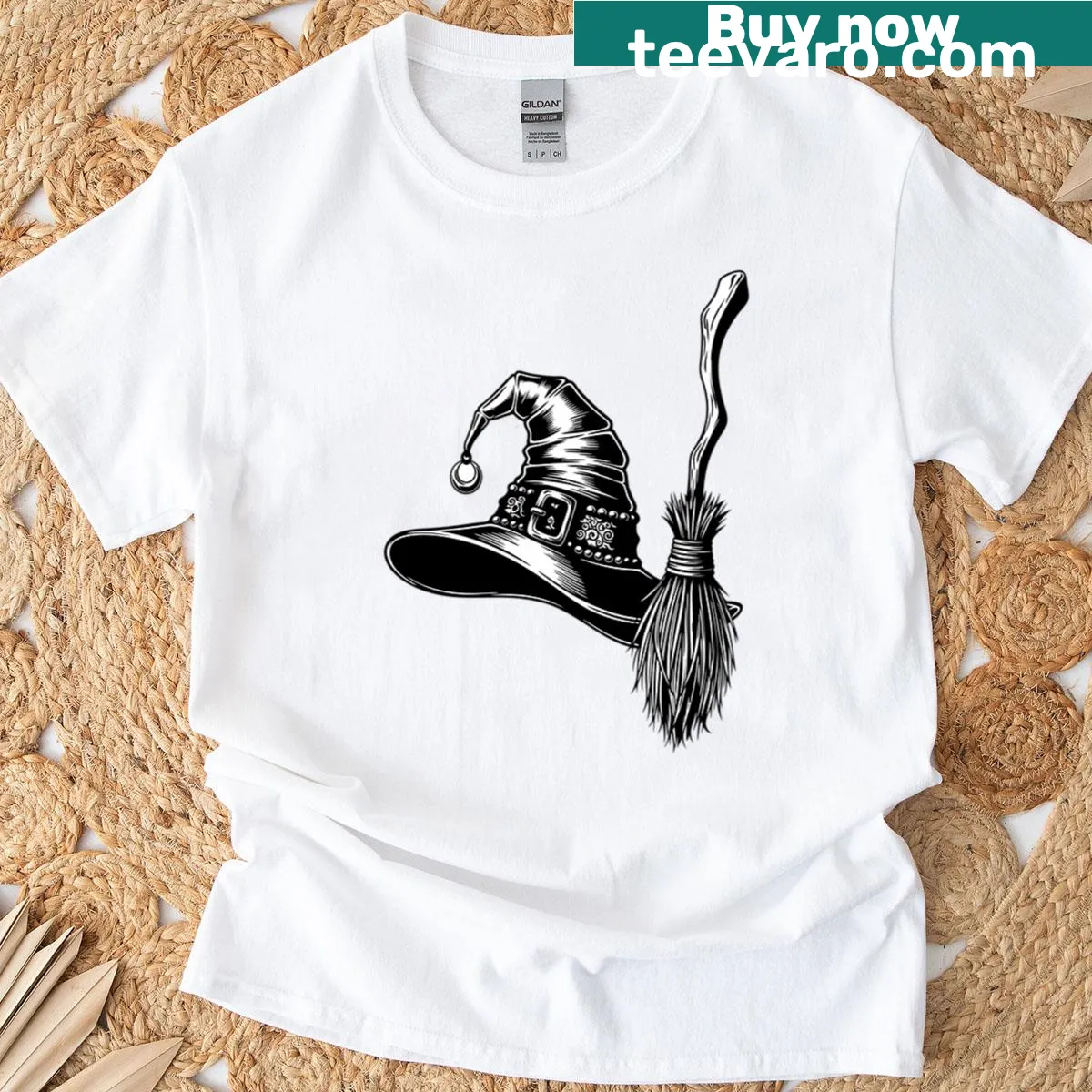 Minimalist silhouette T-shirt of a witch's hat and broom for Halloween — on a men's t-shirt