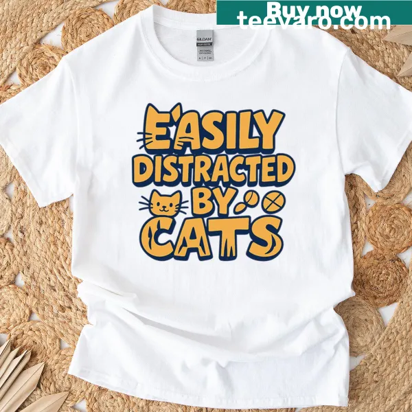Pop art T-shirt with the phrase 'Easily Distracted By Cats' in comic font