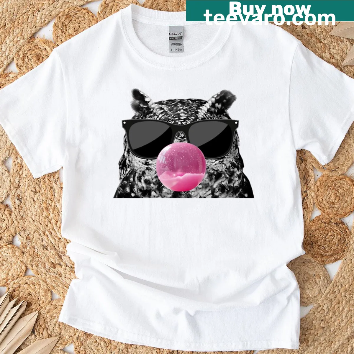 Cute cartoon owl with pink sunglasses and bubble gum graphic for women — on a men's t-shirt